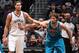 BROOKLYN, NY - MARCH 12: Brook Lopez #11 of the Brooklyn Nets positions himself against twin brother Robin Lopez #15 of the New Orleans Hornets on March 12, 2013 at the Barclays Center in the Brooklyn borough of New York City. NOTE TO USER: User expressl