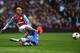 BIRMINGHAM, ENGLAND - MARCH 15: Willian of Chelsea fouls Karim El Ahmadi of Aston Villa and is booked during the Barclays Premier League match between Aston Villa and Chelsea at Villa Park on March 15, 2014 in Birmingham, England. (Photo by Michael Rega