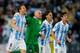 MALAGA, SPAIN - MARCH 13: (L-R) Ignacio Camacho, goalkeeper Willy Caballero, Martin Demichelis and Lucas Piazon of Malaga CF celebrate at the end of the UEFA Champions League Round of 16 second leg match between Malaga CF and FC Porto at La Rosaleda Stadi