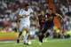 MADRID, SPAIN - AUGUST 29: Angel Di Maria of Real Madrid CF (L) duels for the ball with Jordi Alba of FC Barcelona during the Super Cup second leg match betwen Real Madrid and FC Barcelona at Estadio Santiago Bernabeu on August 29, 2012 in Madrid, Spain.