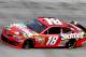 BRISTOL, TN - MARCH 14: Kyle Busch drives the #18 Skittles Toyota during qualifying for the NASCAR Sprint Cup Series Food City 500 at Bristol Motor Speedway on March 14, 2014 in Bristol, Tennessee. (Photo by Jerry Markland/Getty Images)