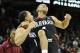 Mar 20, 2014; Spokane, WA, USA; Harvard Crimson guard Brandyn Curry (10, left) and guard Siyani Chambers (1) celebrate after a men's college basketball game during the second round of the 2014 NCAA Tournament against the North Dakota State Bison at Vetera