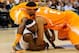 RALEIGH, NC - MARCH 21: Chaz Williams #3 of the Massachusetts Minutemen with the ball against Armani Moore #4 and Jarnell Stokes #5 of the Tennessee Volunteers in the second half in the second round of the 2014 NCAA Men's Basketball Tournament at PNC Are