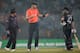 CHITTAGONG, BANGLADESH - MARCH 22: England captain Stuart Broad speaks with New Zealand captain Brendan McCullum as rain stops play during the ICC World Twenty20 Bangladesh 2014 group 1 match between England and New Zealand at Zahur Ahmed Chowdhury Stadi