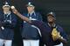 Joe Girardi (background, L) and Larry Rothschild (background, R) could both benefit much from a healthy and effective Pineda.