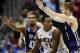 Mar 21, 2014; San Diego, CA, USA; VCU Rams guard Treveon Graham (21) is defended by Stephen F. Austin Lumberjacks guard Trey Pinkney (10) and guard Thomas Walkup in the second half of a men's college basketball game during the second round of the 2014 NCA