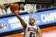 Mar 15, 2014; El Paso, TX, USA; Louisiana Tech Bulldogs guard Kenyon McNeail (21) shoots a layup against the Tulsa Golden Hurricane defense in the championship game of the Conference USA college basketball tournament at Don Haskins Center. Mandatory Credi