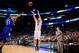 Mar 22, 2014; Orlando, FL, USA; Louisville Cardinals guard/forward Luke Hancock (11) shoots a three point shot against Saint Louis Billikens forward Dwayne Evans (21) in the second half of a men's college basketball game during the third round of the 2014