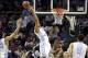 Mar 21, 2014; San Antonio, TX, USA; North Carolina Tar Heels forward Isaiah Hicks (22) shoots over Providence Friars forward Kadeem Batts (10) in the first half of a men's college basketball game during the second round of the 2014 NCAA Tournament at AT&T