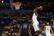 Mar 21, 2014; St. Louis, MO, USA; Kentucky Wildcats forward Julius Randle (30) dunks the ball past Kansas State Wildcats guard Nigel Johnson (23) in the first half during the 2nd round of the 2014 NCAA Men's Basketball Championship at Scottrade Center. Ma
