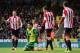 NORWICH, ENGLAND - MARCH 22: Ricky Van Wolfswinkel (2nd L) of Norwich City reacts after missing a chance during the Barclays Premier League match between Norwich City and Sunderland at Carrow Road on March 22, 2014 in Norwich, England. (Photo by Alex Bro