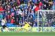 CARDIFF, WALES - MARCH 22: Luis Suarez (L) of Liverpool scores his third goal and his teams sixth during the Barclays Premier League match between Cardiff City and Liverpool at the Cardiff City Stadium on March 22, 2014 in Cardiff, Wales. (Photo by Mich