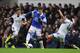 LIVERPOOL, ENGLAND - MARCH 22: Ross Barkley of Everton takes on Jose Alberto Canas (L) and Chico of Swansea City during the Barclays Premier League match between Everton and Swansea City at Goodison Park on March 22, 2014 in Liverpool, England. (Photo by