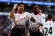 CARDIFF, WALES - MARCH 22: Daniel Sturridge of Liverpool celebrates with team mate Luis Suarez after scoring his team's fifth goal during the Barclays Premier League match between Cardiff City and Liverpool at Cardiff City Stadium on March 22, 2014 in Ca