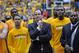 WICHITA, KS - FEBRUARY 22: Head coach Gregg Marshall (C) of the Wichita State Shockers watches his team cut down the nets after beating the Drake Bulldogs to win the Missouri Valley Conference on February 22, 2014 at Charles Koch Arena in Wichita, Kansas