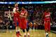 BUFFALO, NY - MARCH 22: Matt Kavanaugh #35,Vee Sanford #43, and Jordan Sibert #24 of the Dayton Flyers celebrate after defeating the Syracuse Orange 55-53 in the third round of the 2014 NCAA Men's Basketball Tournament at the First Niagara Center on March