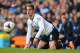 LONDON, ENGLAND - MARCH 23: Roberto Soldado of Tottenham Hotspur falls to his knees during the Barclays Premier League match between Tottenham Hotspur and Southampton at White Hart Lane on March 23, 2014 in London, England. (Photo by Clive Rose/Getty Ima