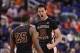 Mar 13, 2014; Greensboro, NC, USA; Florida State Seminoles center Boris Bojanovsky (15) reacts with guard Aaron Thomas (25) after hitting the game winning shot. The Seminoles defeated the Terrapins 67-65 in the second round of the ACC college basketball t