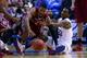 ST LOUIS, MO - MARCH 21: Corey Walden #2 of the Eastern Kentucky Colonels dives for the ball against Andrew Wiggins #22 of the Kansas Jayhawks during the second round of the 2014 NCAA Men's Basketball Tournament at Scottrade Center on March 21, 2014 in S