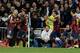 On target: Andres Iniesta (left) opened the scoring.