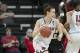 Mar 23, 2014; Iowa City, IA, USA; Louisville Cardinals guard Megan Deines (15) dribbles the ball against the Idaho Vandals in the second half of a women's college basketball game in the first round of the NCAA Tournament at Carver-Hawkeye Arena. Mandatory