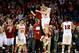 Mar 22, 2014; Milwaukee, WI, USA; Wisconsin Badgers forward Frank Kaminsky (44) celebrates with teammates after defeating the Oregon Ducks during the third round of the 2014 NCAA Tournament at BMO Harris Bradley Center. Wisconsin defeated Oregon 85-77. Ma