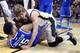 ST LOUIS, MO - MARCH 23: wRon Baker #31 of the Wichita State Shockers falls on top of Willie Cauley-Stein #15 of the Kentucky Wildcats during the third round of the 2014 NCAA Men's Basketball Tournament at Scottrade Center on March 23, 2014 in St Louis,