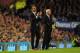 LIVERPOOL, ENGLAND - SEPTEMBER 30: Everton manager Roberto Martinez (l) and Alan Pardew react during the Barclays Premier League match between Everton and Newcastle United at Goodison Park on September 30, 2013 in Liverpool, England. (Photo by Stu Forst