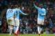 MANCHESTER, ENGLAND - MARCH 22: Yaya Toure of Manchester City celebrates scoring their second goal with Fernandinho of Manchester City during the Barclays Premier League match between Manchester City and Fulham at Etihad Stadium on March 22, 2014 in Manc