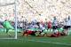 CARDIFF, WALES - MARCH 08: Sascha Riether of Fulham (27) challenges with Jordon Mutch (18) and Fraizer Campbell of Cardiff City which leads to an own goal for Cardiff City's third goal as Maarten Stekelenburg of Fulham (L) looks on during the Barclays Pr