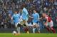 MANCHESTER, ENGLAND - MARCH 22: Yaya Toure of Manchester City scores their second goal from the penalty spot during the Barclays Premier League match between Manchester City and Fulham at Etihad Stadium on March 22, 2014 in Manchester, England. (Photo b