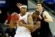 RALEIGH, NC - MARCH 23: Anthony White Jr. #15 and Daniel Coursey #52 of the Mercer Bears defend Jarnell Stokes #5 of the Tennessee Volunteers in the second half during the third round of the 2014 NCAA Men's Basketball Tournament at PNC Arena on March 23,