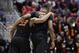 Mar 21, 2014; San Diego, CA, USA; Oklahoma State Cowboys guard Marcus Smart (33) and forward/center Kamari Murphy (21) head for the bench in the second half of a men's college basketball game during the second round of the 2014 NCAA Tournament against the