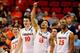 RALEIGH, NC - MARCH 23: Joe Harris #12, Mike Tobey #10, Anthony Gill #13 and Akil Mitchell #25 of the Virginia Cavaliers react late in the game against the Memphis Tigers during the third round of the 2014 NCAA Men's Basketball Tournament at PNC Arena on