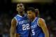 ATLANTA, GA - MARCH 16: Alex Poythress #22 and Andrew Harrison #5 of the Kentucky Wildcats react after Harrison was called for a foul in the first half against the Florida Gators during the Championship game of the 2014 Men's SEC Basketball Tournament at