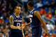 BUFFALO, NY - MARCH 22: Shabazz Napier #13 celebrates with Lasan Kromah #20 of the Connecticut Huskies during the third round of the 2014 NCAA Men's Basketball Tournament against the Villanova Wildcats at the First Niagara Center on March 22, 2014 in Buff