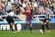 NEWCASTLE UPON TYNE, ENGLAND - MARCH 22 : Fabricio Coloccini (L) and Paul Dummett of Newcastle challenge Kagisho Dikgacoi of Crystal Palace during the Barclays Premier League match between Newcastle and Crystal Palace at St James Park on March 22, 2014 in