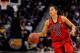 NEW ORLEANS, LA - APRIL 09: Shoni Schimmel #23 of the Louisville Cardinals looks for an open team mate against the Connecticut Huskies during the National Final game of the 2013 NCAA Division I Women's Basketball Championship at New Orleans Arena on Apri