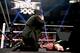 Paul Heyman checks on a wounded Lesnar.