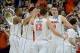 Mar 23, 2014; Raleigh, NC, USA; Virginia Cavaliers forward/center Mike Tobey (10) celebrates with guard Joe Harris (12) against the Memphis Tigers during the first half of a men's college basketball game during the third round of the 2014 NCAA Tournament