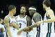 Feb 1, 2014; Memphis, TN, USA; Memphis Grizzlies forwards James Johnson (3) and Zach Randolph (50) talk as guard Courtney Lee (5) and center Marc Gasol (33) look on in the game against the Milwaukee Bucks at FedExForum. Memphis defeated Milwaukee 99-90. M