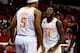 RALEIGH, NC - MARCH 23: Jeronne Maymon #34 and Jarnell Stokes #5 of the Tennessee Volunteers celebrate after a play early in the first half against the Mercer Bears during the third round of the 2014 NCAA Men's Basketball Tournament at PNC Arena on March