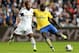 SWANSEA, WALES - SEPTEMBER 28: Bacary Sagna of Arsenal (R) in action with Wayne Routledge of Swansea during the Barclays Premier League match between Swansea City and Arsenal at Liberty Stadium on September 28, 2013 in Swansea, Wales. (Photo by Scott He