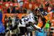DENVER, CO - SEPTEMBER 5: James Ihedigbo #32 of the Baltimore Ravens hits Julius Thomas #80 of the Denver Broncos as he attempts to catch a pass in the first quarter during the game at Sports Authority Field at Mile High on September 5, 2013 in Denver Col