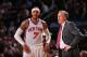 NEW YORK - JANUARY 11: Carmelo Anthony #7 of the New York Knicks talks to head coach Mike D'Antoni during the game against the Philadelphia 76ers on January 11, 2012 at Madison Square Garden in New York, New York. NOTE TO USER: User expressly acknowledge