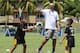 KUALA LUMPUR, MALAYSIA - MARCH 24: Laureus Academy Member Daley Thompson interacts with players during the LWSA COBRA Rugby Project Visit ahead of the Laureus World Sports Awards at Padang Timur on March 24, 2014 in Kuala Lumpur, Malaysia. (Photo by Ian