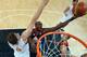 LONDON, ENGLAND - AUGUST 02: (EDITORS NOTE: A polarizing filter was used for this image.) Luol Deng #9 of Great Britain shoots against Pau Gasol #4 of Spain in the second half during the Men's Basketball Preliminary Round match on Day 6 of the London 20