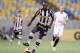 Clarence Seedorf helped Botafogo qualify for the Copa Libertadores, but left to manage Milan