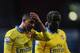 LONDON, ENGLAND - DECEMBER 26: Theo Walcott (L) and Bacary Sagna of Arsenal look on after the Barclays Premier League match between West Ham United and Arsenal at Boleyn Ground on December 26, 2013 in London, England. (Photo by Ian Walton/Getty Images)