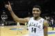 Mar 22, 2014; Spokane, WA, USA; Michigan State Spartans guard Gary Harris (14) celebrates after a men's college basketball game during the third round of the 2014 NCAA Tournament against the Harvard Crimson at Veterans Memorial Arena. The Spartans defeate